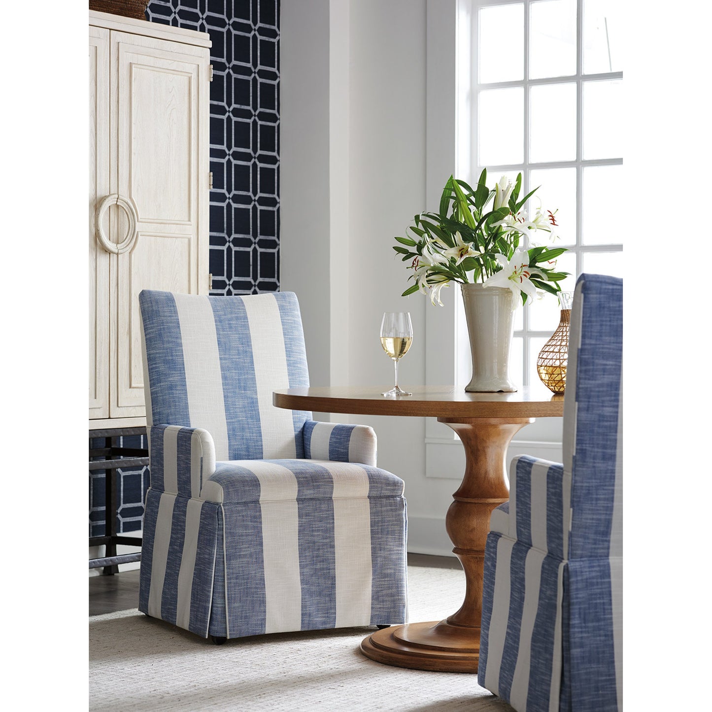 003 SR-834947 | Lifestyle | Mackenzie Dining Arm Chair by Barclay Butera in denim stripe. Made from unique in a coastal style.