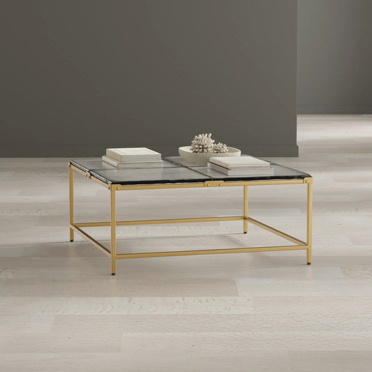 Titus Coffee Table by Sarreid Ltd. in bronze and cast glass top. Made from unique in a modern style.