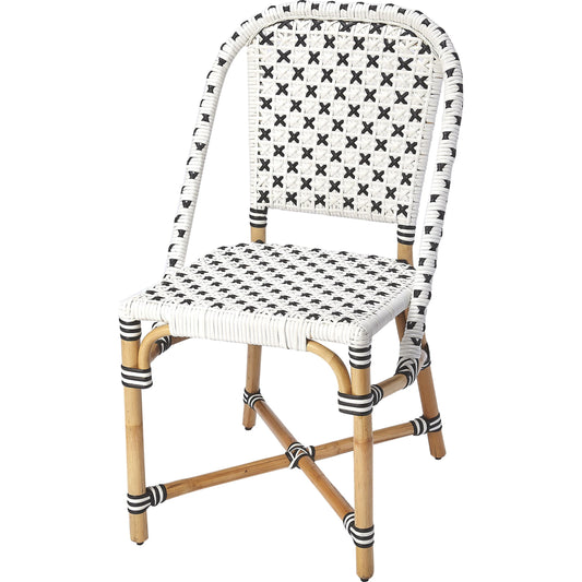 Tenor Dining Chair by Butler Specialty Company in white. Made from 60%-pe plastic weave, 40%-rattan in a coastal style.
