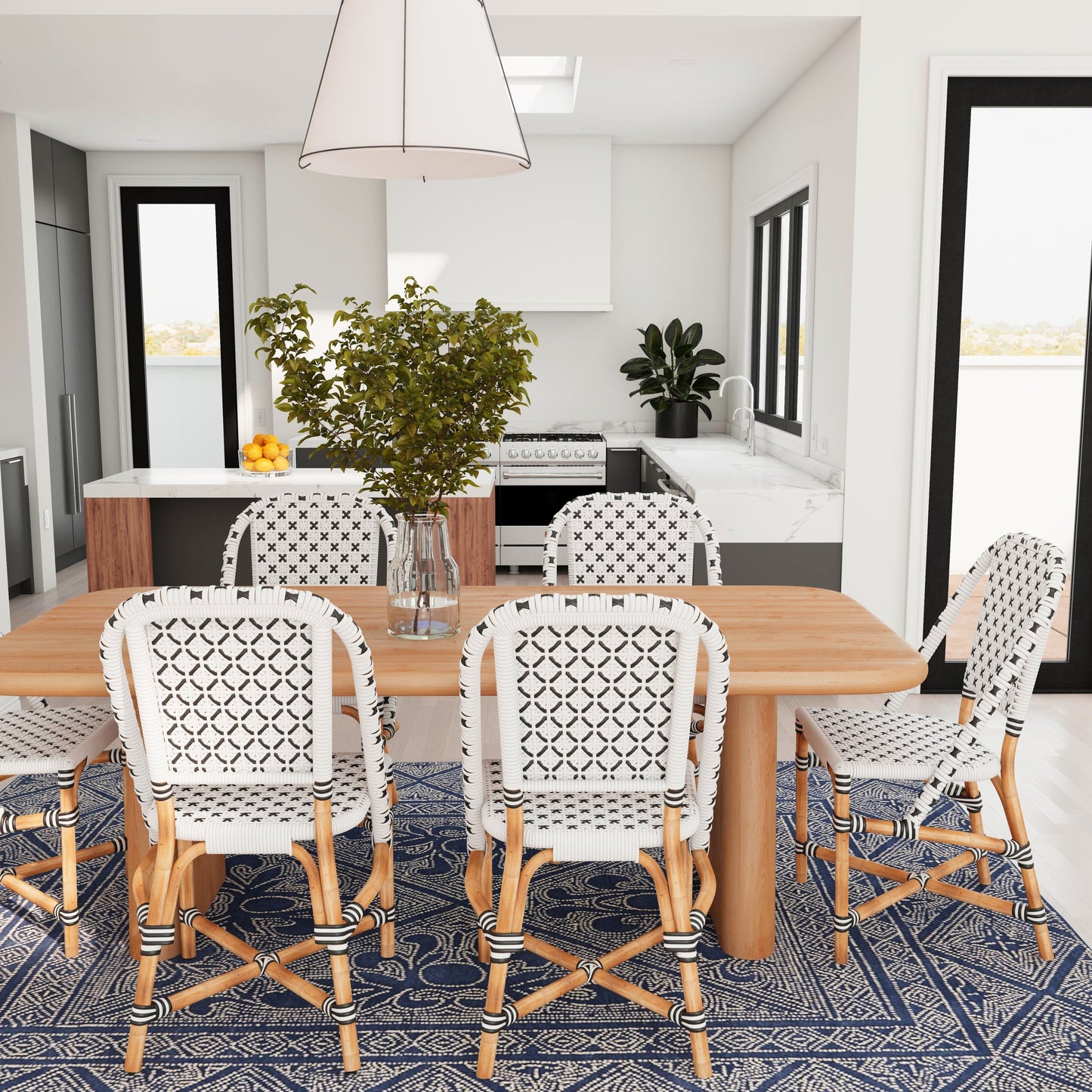 018 SR-770515 | Lifestyle | Tenor Dining Chair by Butler Specialty Company in white. Made from 60%-pe plastic weave, 40%-rattan in a coastal style.