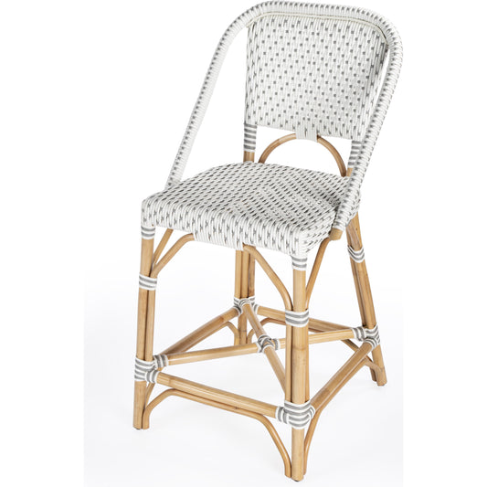 Solstice Counter Stool by Butler Specialty Company. Made from rattan, plastic weave in a coastal style.