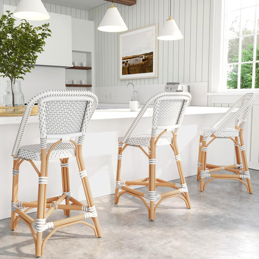 Solstice Counter Stool by Butler Specialty Company. Made from rattan, plastic weave in a coastal style.