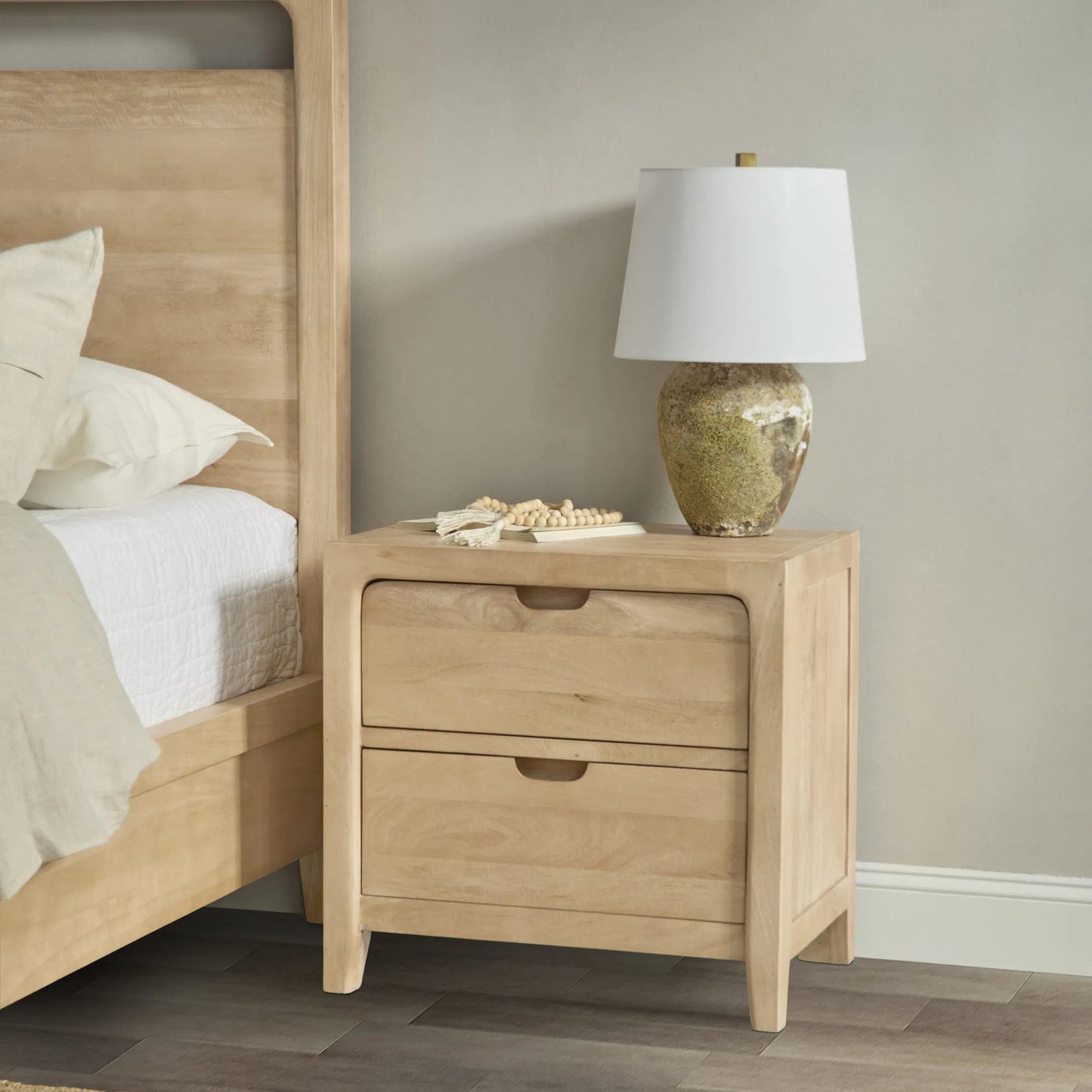 009 SI-2353754 | Closeup | Laguna 2-Drawer Mango Wood Nightstand by Classic Home in natural. Made from mango wood in a unique style.
