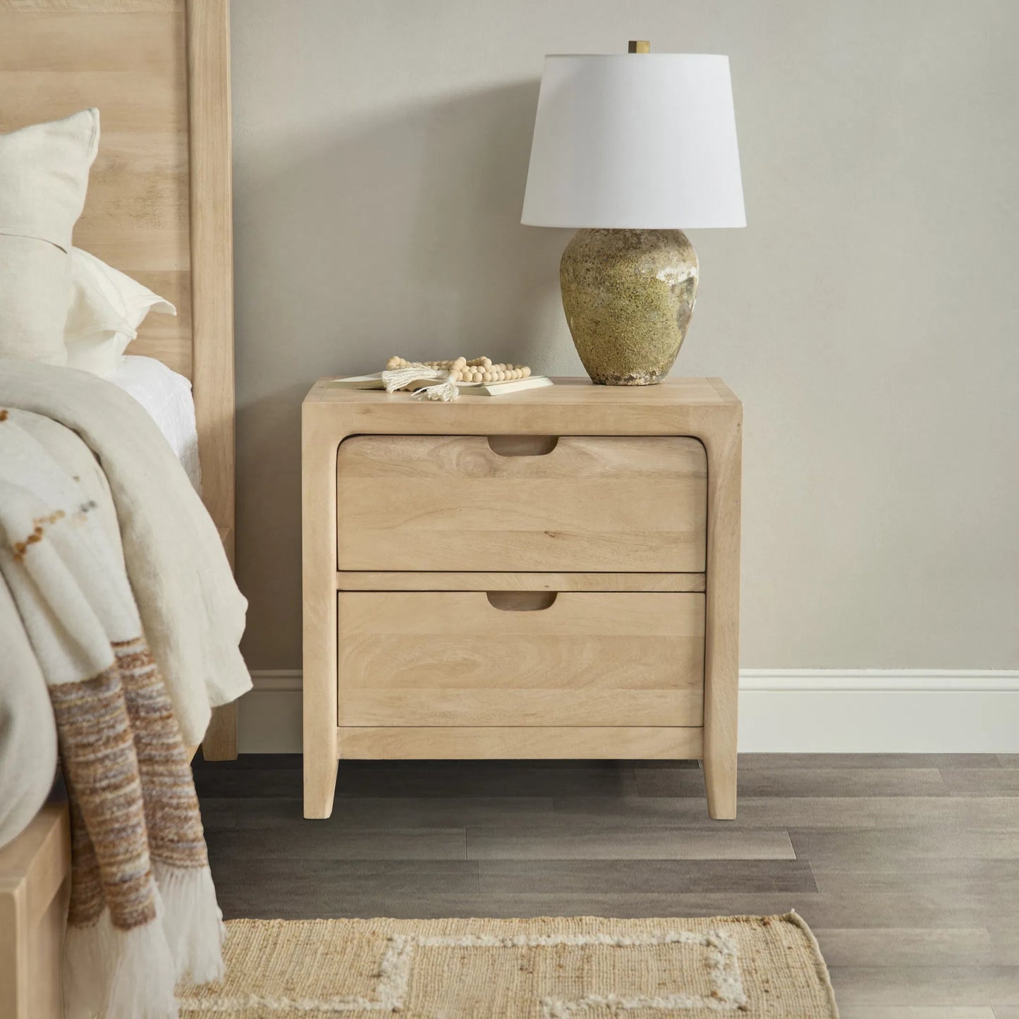 007 SI-2353754 | Closeup | Laguna 2-Drawer Mango Wood Nightstand by Classic Home in natural. Made from mango wood in a unique style.