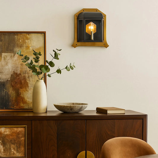Gaslighter 1 Light Sconce by Varaluz in black. Made from brass in a unique style.