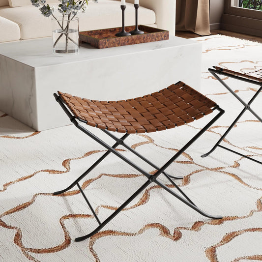 Karma Stool by Butler Specialty Company in medium brown and brown leather. Made from iron, real leather, steel metal nail heads in a rustic style.