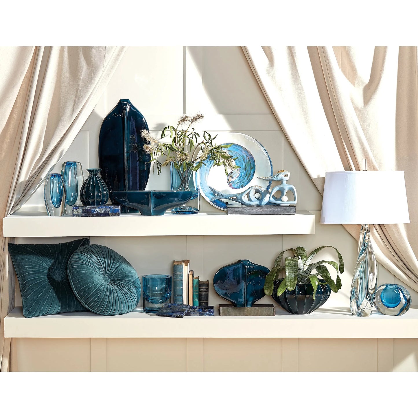 008 SR-891520,SR-891522 | Lifestyle | Center Ridge Vase by Global Views in blue. Made from earthenware-reactive glaze in a modern style.