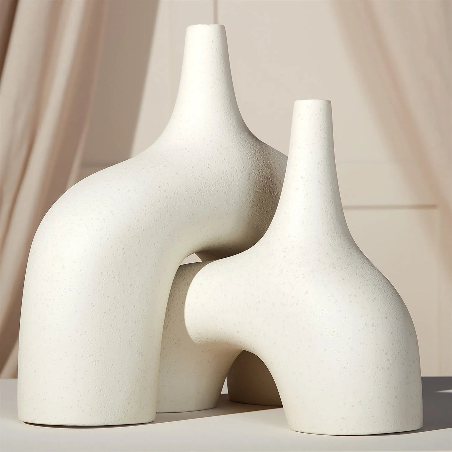 012 SR-893238,SR-893239 | Unknown | Stretch Vase by Global Views. Made from earthenware in a eclectic & global style.