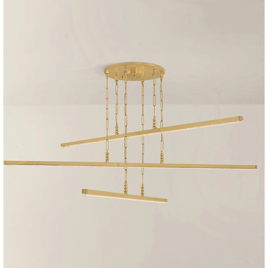 Cortina Chandelier by Corbett in vintage brass. Made from unique in a modern style.