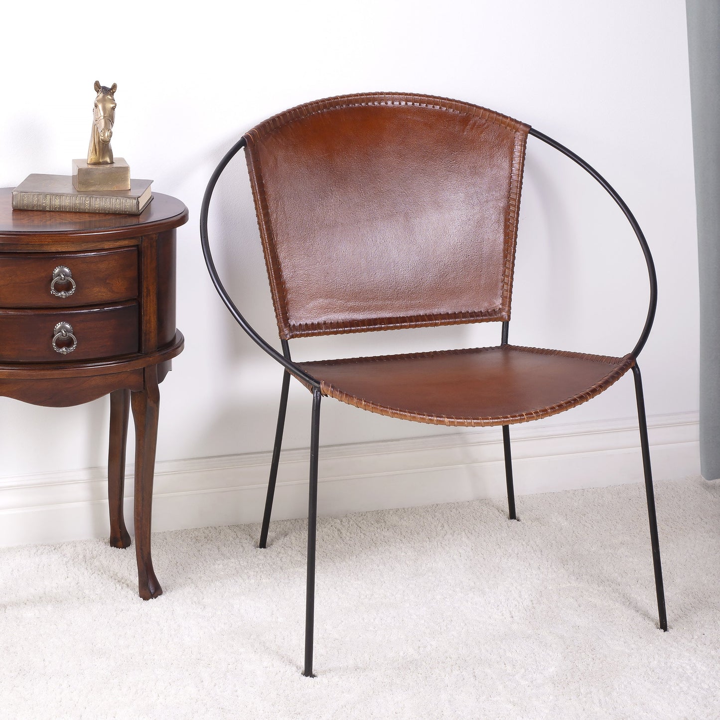 008 SR-868032 | Lifestyle | Milo Accent Chair by Butler Specialty Company in brown and brown leather. Made from leather goat, iron frame, urethane foam in a modern style.