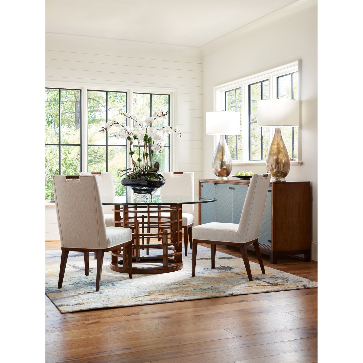 004 SR-836268 | Lifestyle | Meridien Round Dining Table by Tommy Bahama Home. Made from unique in a modern style.