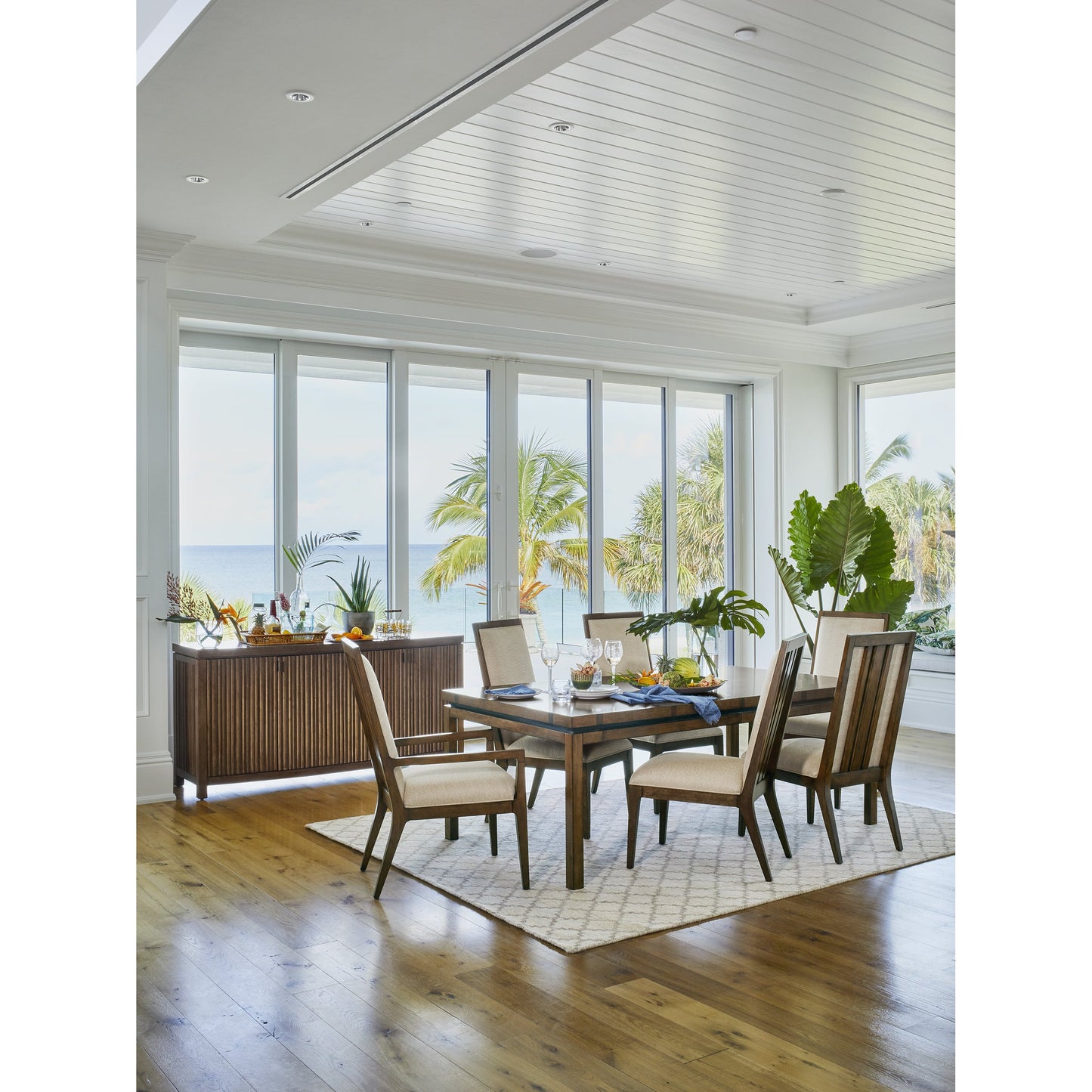007 SR-836257 | Lifestyle | Marquesa Rectangular Dining Table by Tommy Bahama Home. Made from unique in a coastal style.