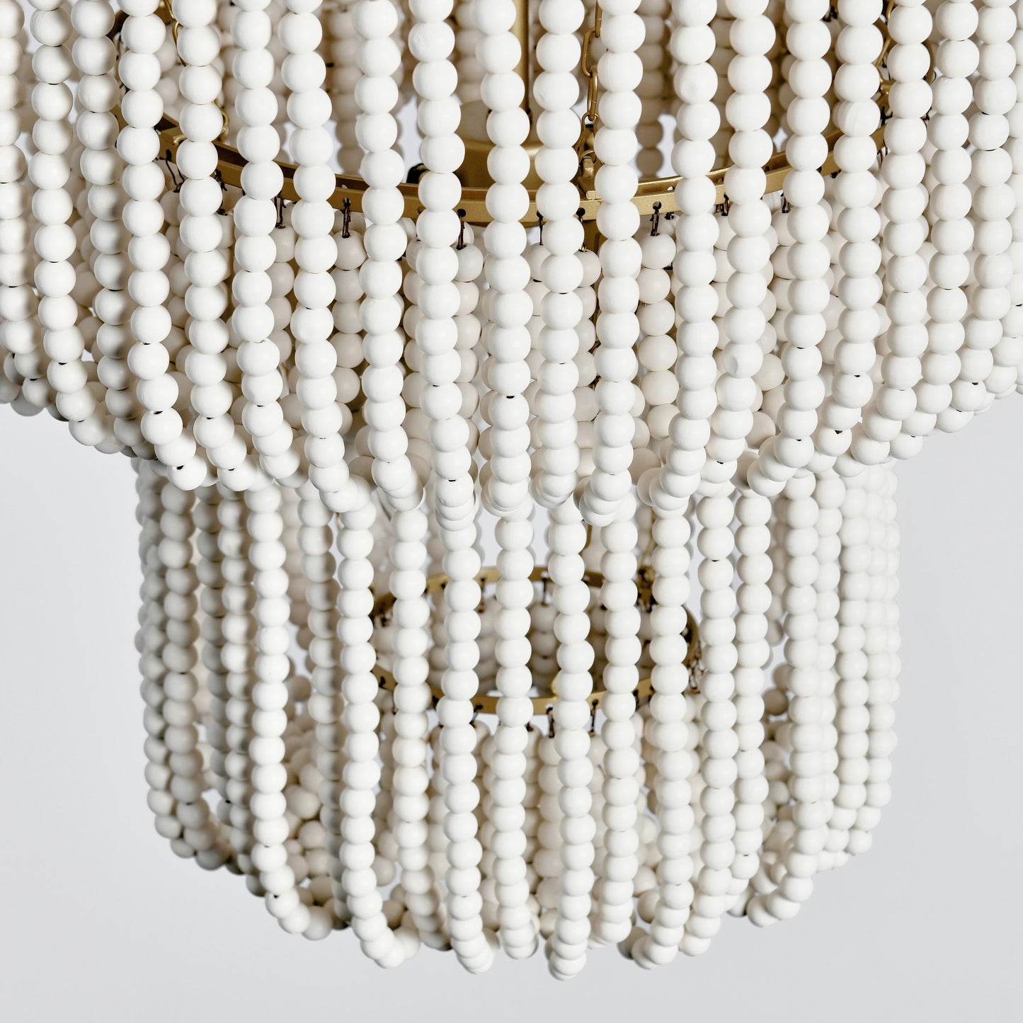 006 SI-2162531 | Closeup | Amanda White Beaded Chandelier by Classic Home in white. Made from wood beads in a cottage & farmhouse style.