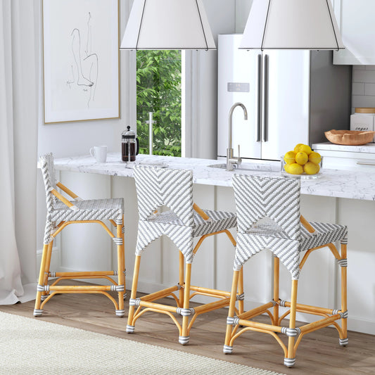 Creanly Counter Stool by Butler Specialty Company in gray and grey. Made from natural rattan, plastic pu in a coastal style.