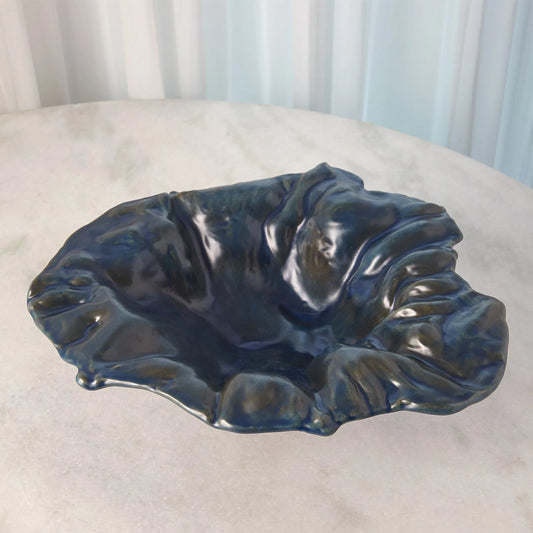 Free Form Blue Bowl by Global Views in reactive blue. Made from ceramic in a eclectic & global style.
