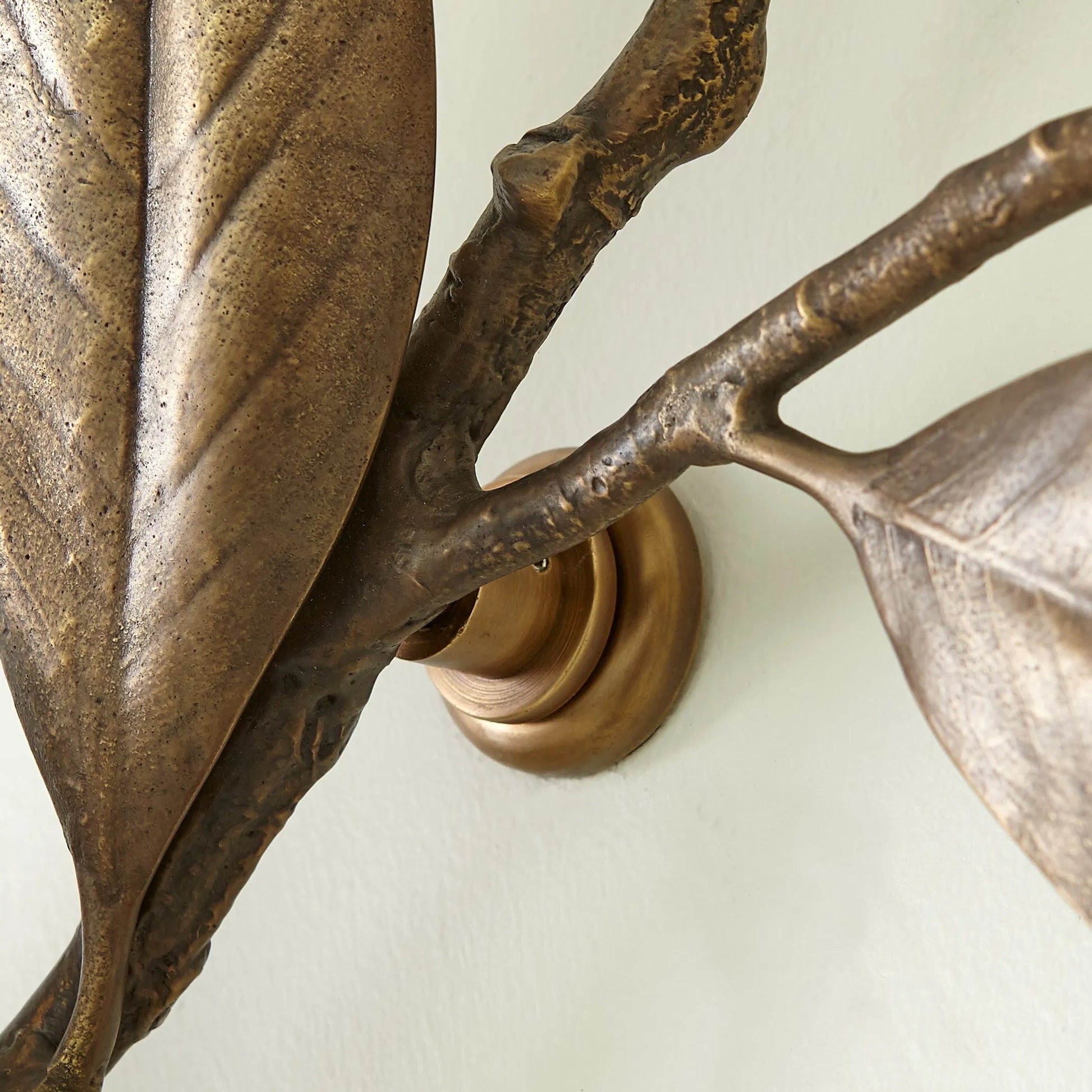 Magnolia Branch Wall Art by Global Views in antique brass, gold. Made from brass in a modern style.
