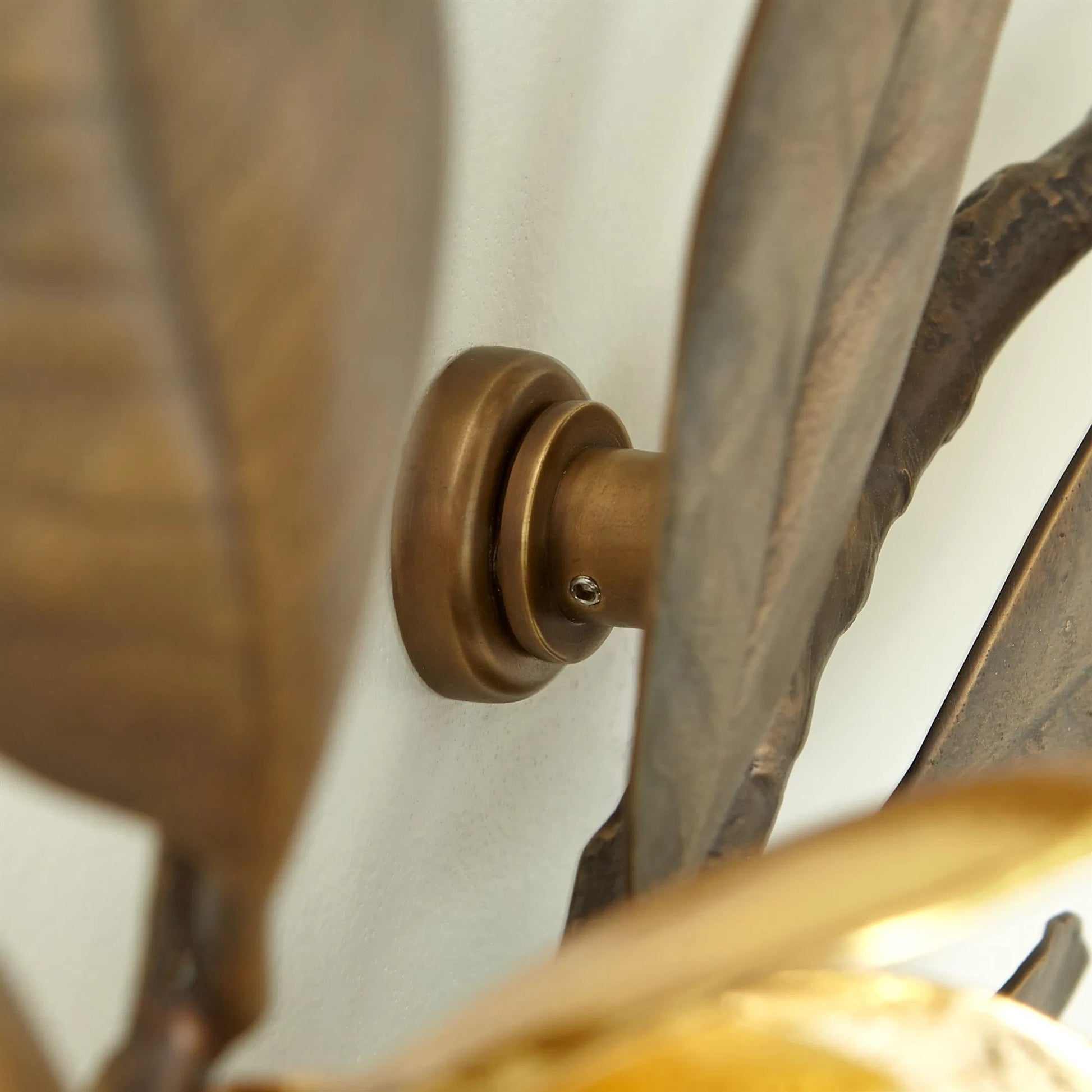 Magnolia Branch Wall Art by Global Views in antique brass, gold. Made from brass in a modern style.