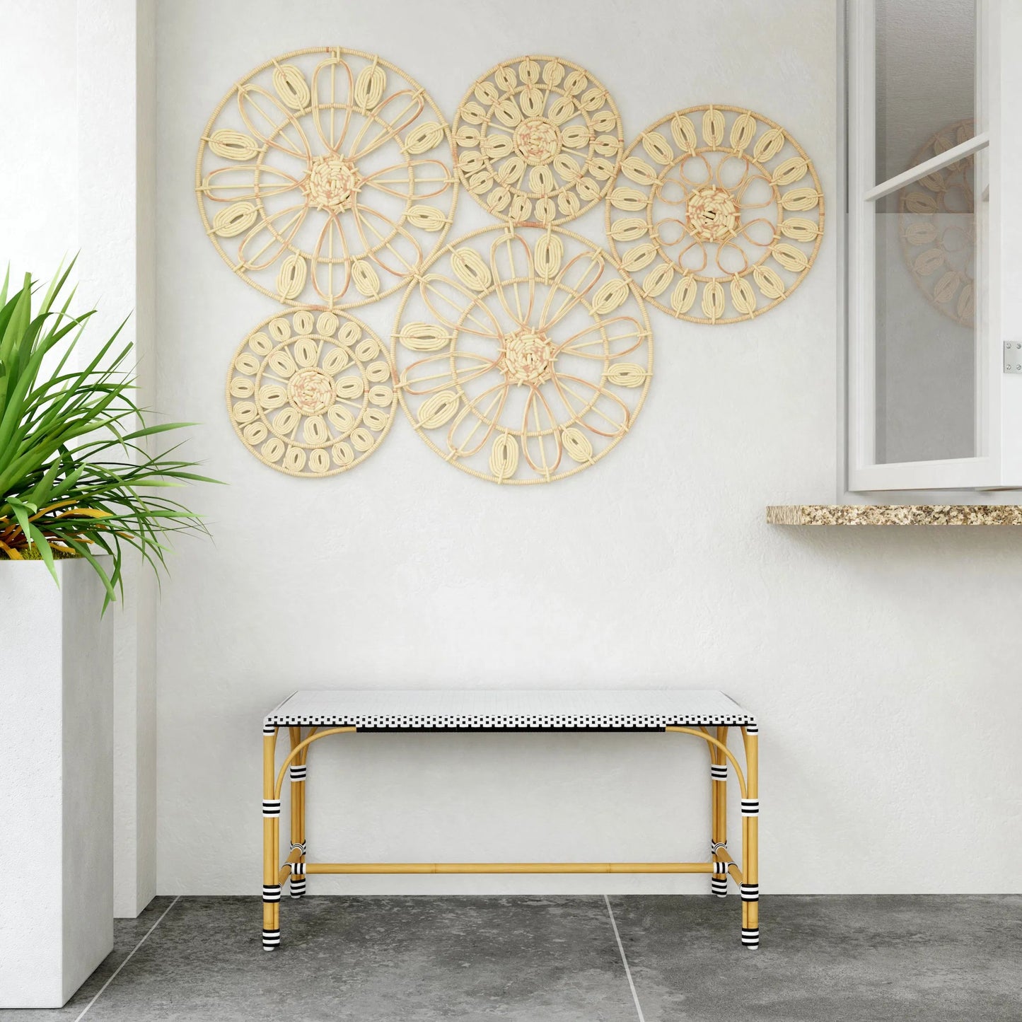 006 SI-2077752 | Lifestyle | Tobias Outdoor Rattan Rectangular Dining Bench by Butler Specialty Company in black and white. Made from polyethylene rattan weave, metal in a coastal style.