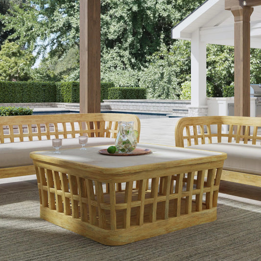 Monhegan Outdoor Coffee Table by Butler Specialty Company in cream,light brown and natural teak. Made from teak wood, marble in a cottage & farmhouse style.