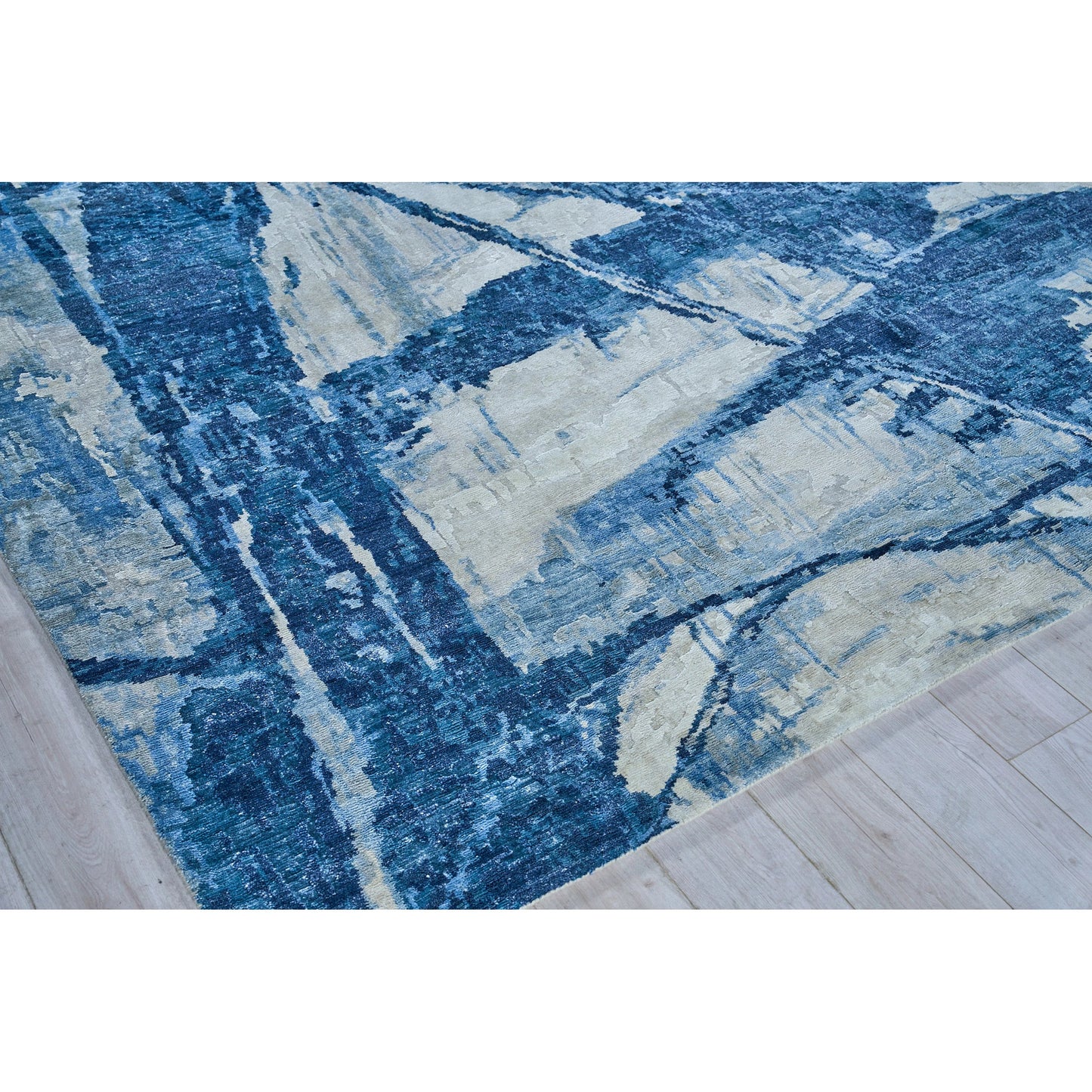 002 SI-2101777,SI-2101778,SI-2101779,SI-2101780,SI-2101781,SI-2101782 | Closeup | Floor Art 5709 Rug by Exquisite Rugs in ivory, dark blue. Made from bamboo silk in a unique style.