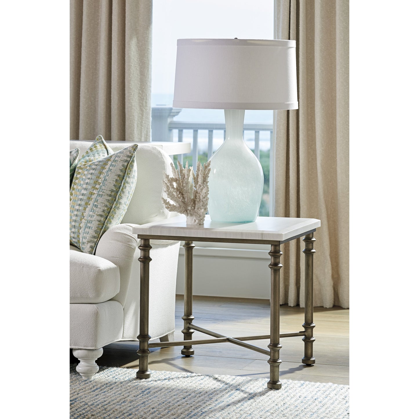 003 SR-836105 | Lifestyle | Flagler Marble Top End Table by Tommy Bahama Home in white marble, pewter. Made from unique in a traditional style.