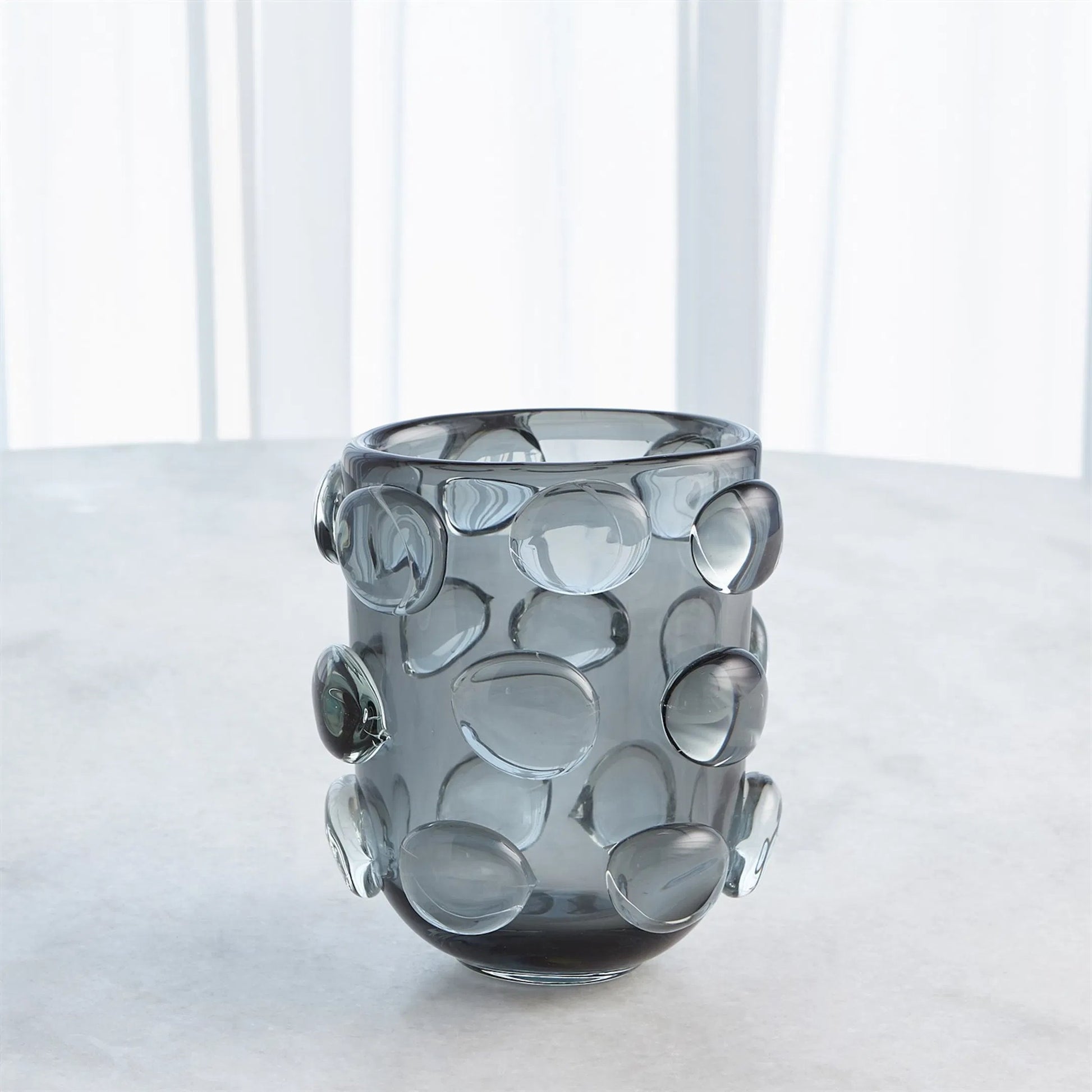 Rondelle Vase by Global Views. Made from art glass in a modern style.