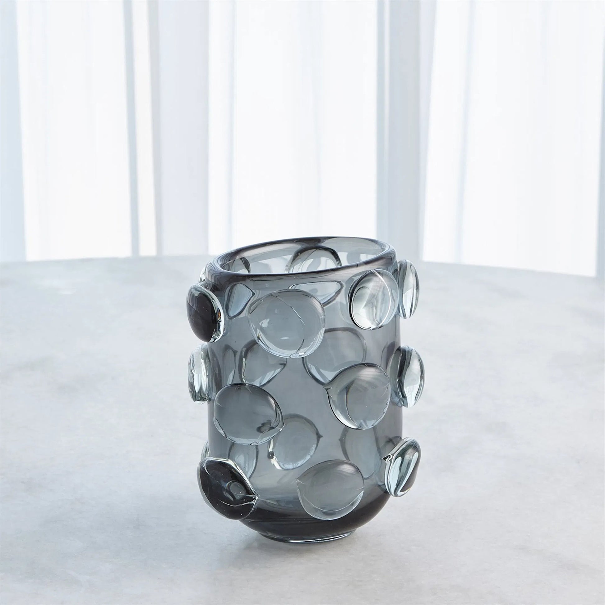Rondelle Vase by Global Views. Made from art glass in a modern style.