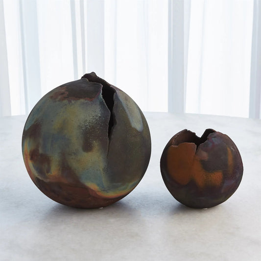 Fissure Open Ball by Global Views in raku. Made from ceramic raku in a rustic style.