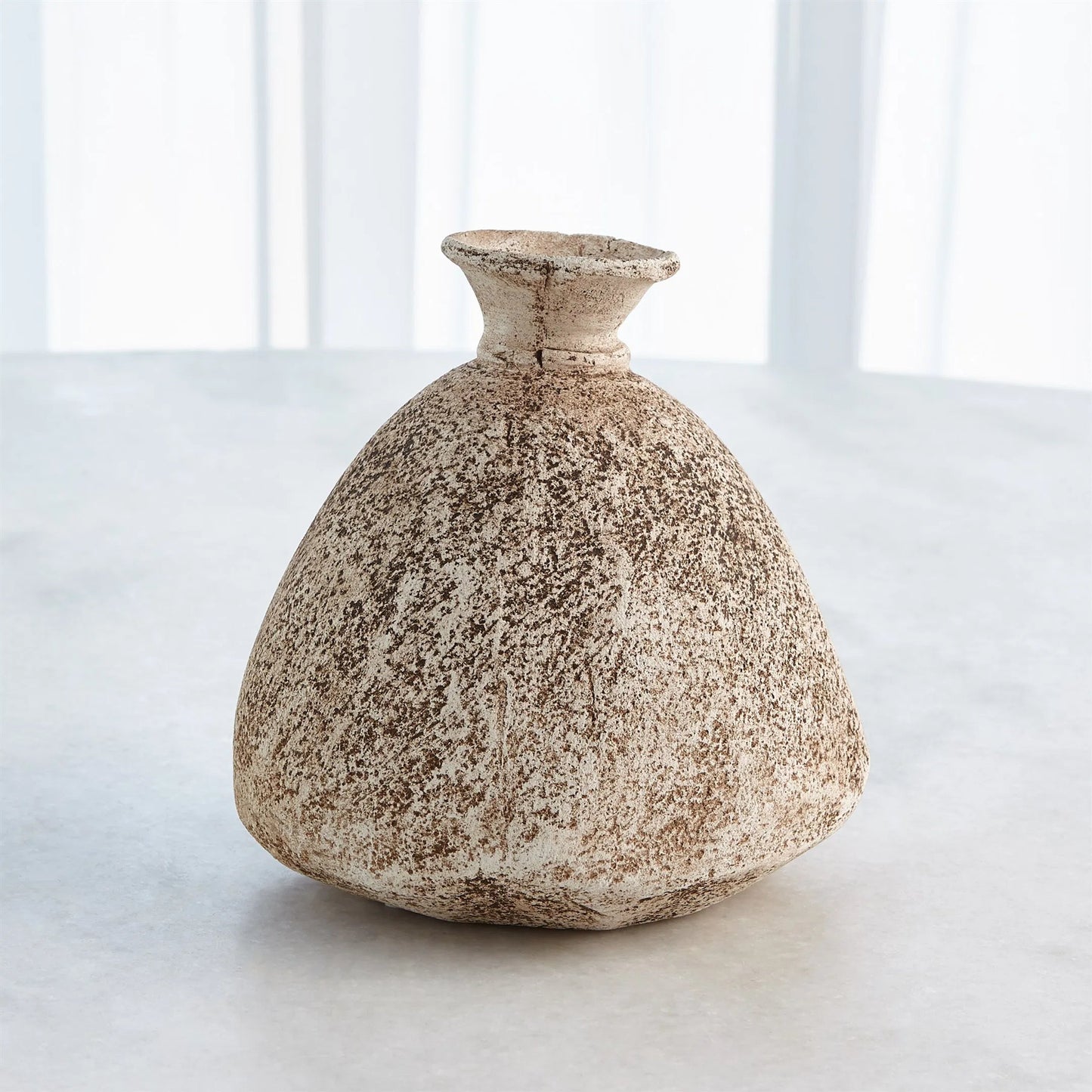 001 SI-2445649 | Lifestyle | Cinder Wide Bottom Vase by Global Views in sand. Made from ceramic raku in a rustic style.
