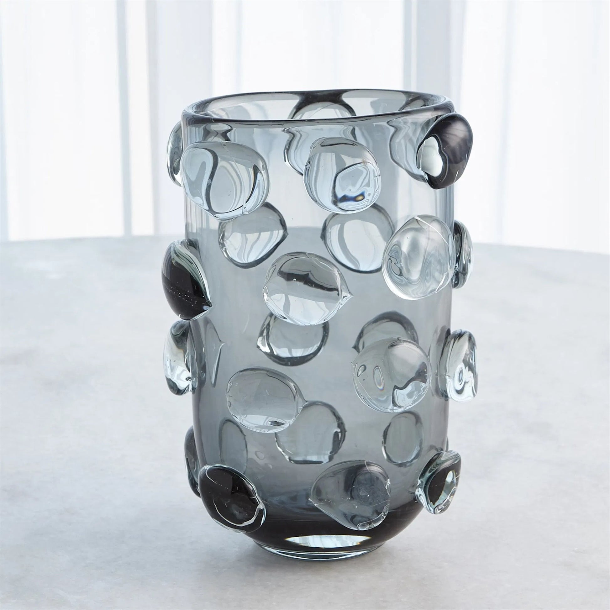 Rondelle Vase by Global Views. Made from art glass in a modern style.