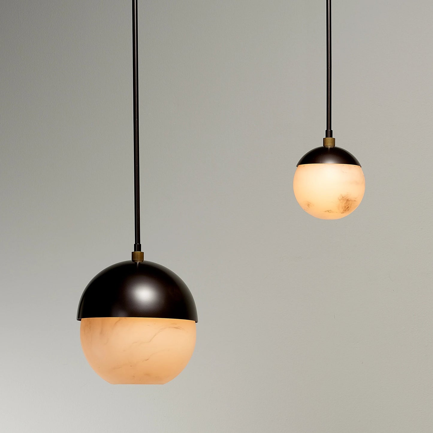 004 SI-1831452 | Lifestyle | Metro Pendant by Jamie Young in oil rubbed bronze, antique brass. Made from faux alabaster, steel in a modern style.