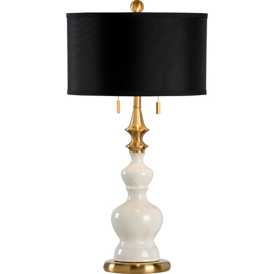 Dana Lamp by Wildwood in oyster white glaze, antique. Made from ceramic, porcelain in a transitional style.