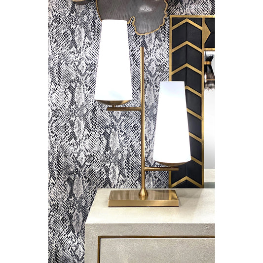 Geminate Lamp by Wildwood in antique brass, matte white. Made from steel, glass in a transitional style.