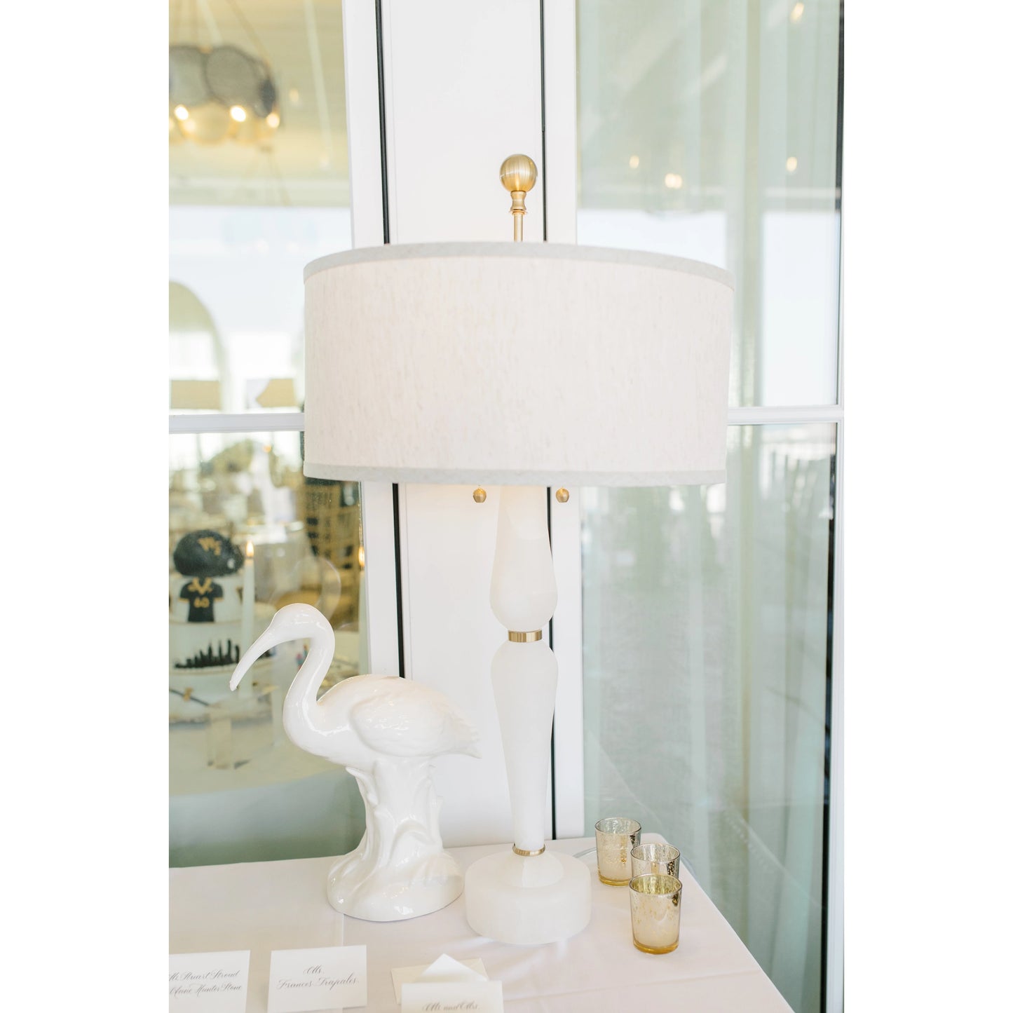 004 SR-384640 | Lifestyle | Adele Lamp by Wildwood in natural white, antique brass. Made from stone in a transitional style.