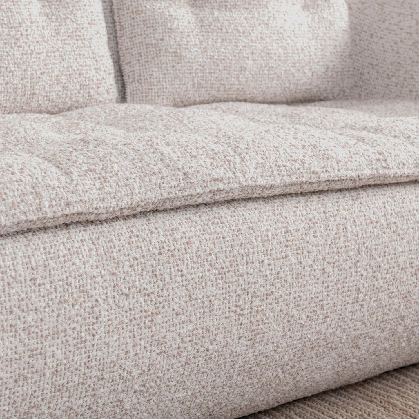 006 SI-2256341 | Closeup | Ember Upholstered Fabric Sofa by Classic Home in cream white. Made from 77% polyester, 23% acrylic, rubberwood in a transitional style.