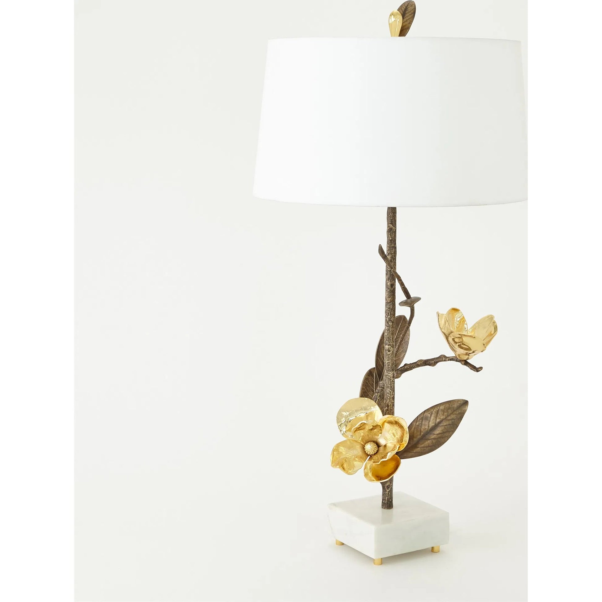 Magnolia Flower Table Lamp by Global Views in antique brass, gold. Made from brass, marble in a modern style.