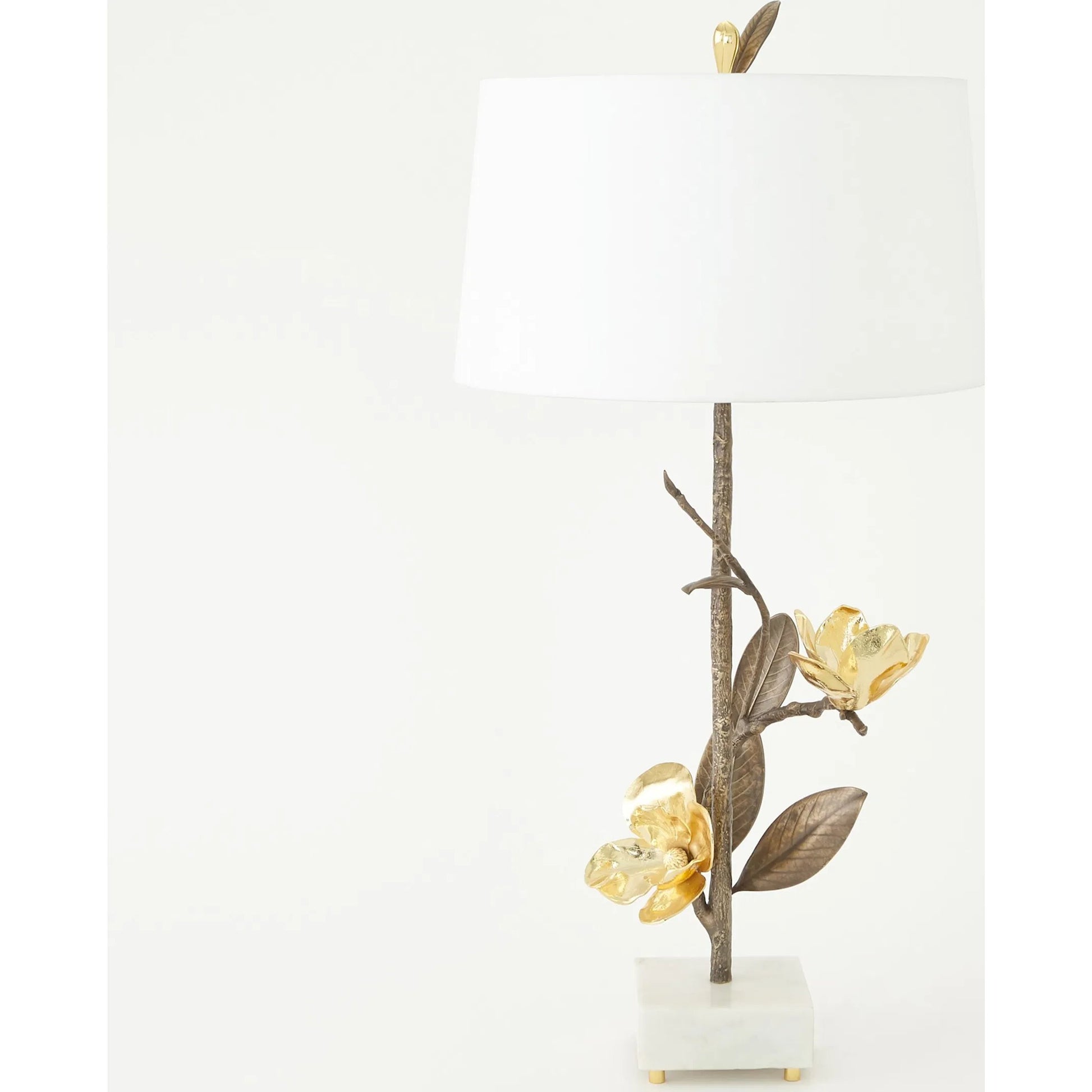 Magnolia Flower Table Lamp by Global Views in antique brass, gold. Made from brass, marble in a modern style.