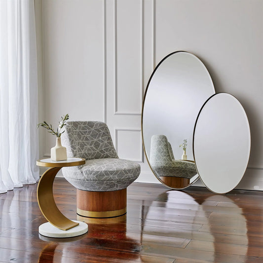 Elongated Oval Mirror by Global Views. Made from unique in a transitional style.