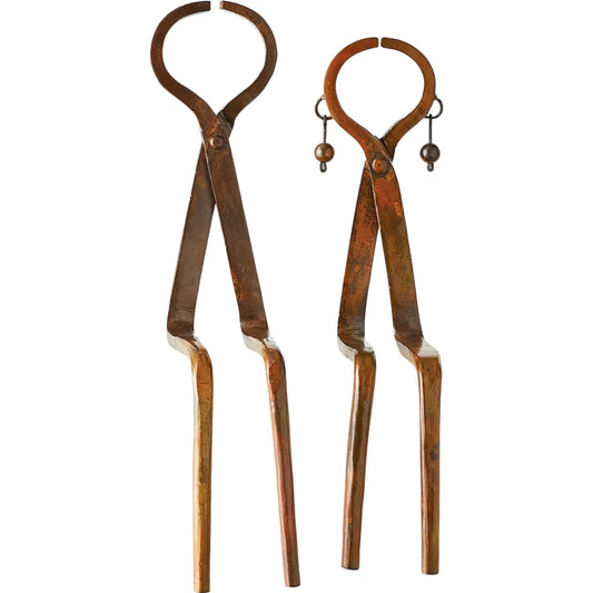 Iron Sitting Couple by Global Views. Made from iron in a modern style.