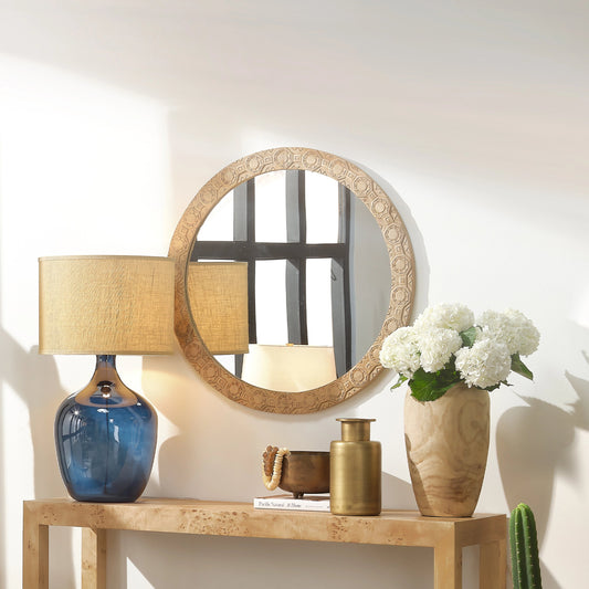 Relief Carved Round Mirror by Jamie Young. Made from wood in a modern style.