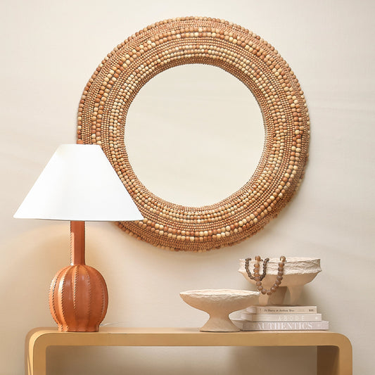 Strand Beaded Mirror by Jamie Young. Made from mango wood in a coastal style.