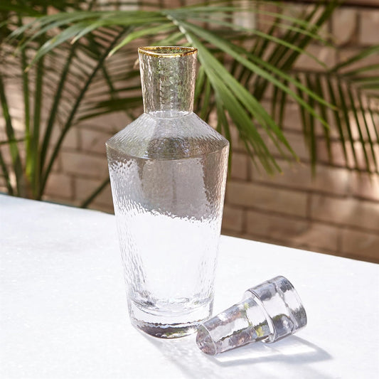 Hammered Decanter by Global Views in clear. Made from glass in a transitional style.