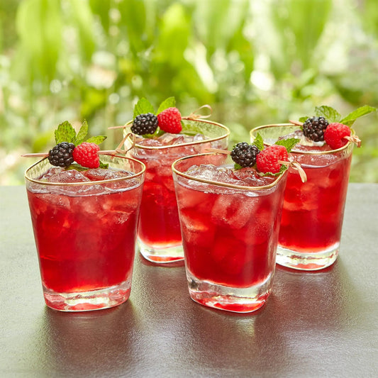 Hammered Water Glasses by Global Views in clear w, gold rim. Made from glass in a transitional style.