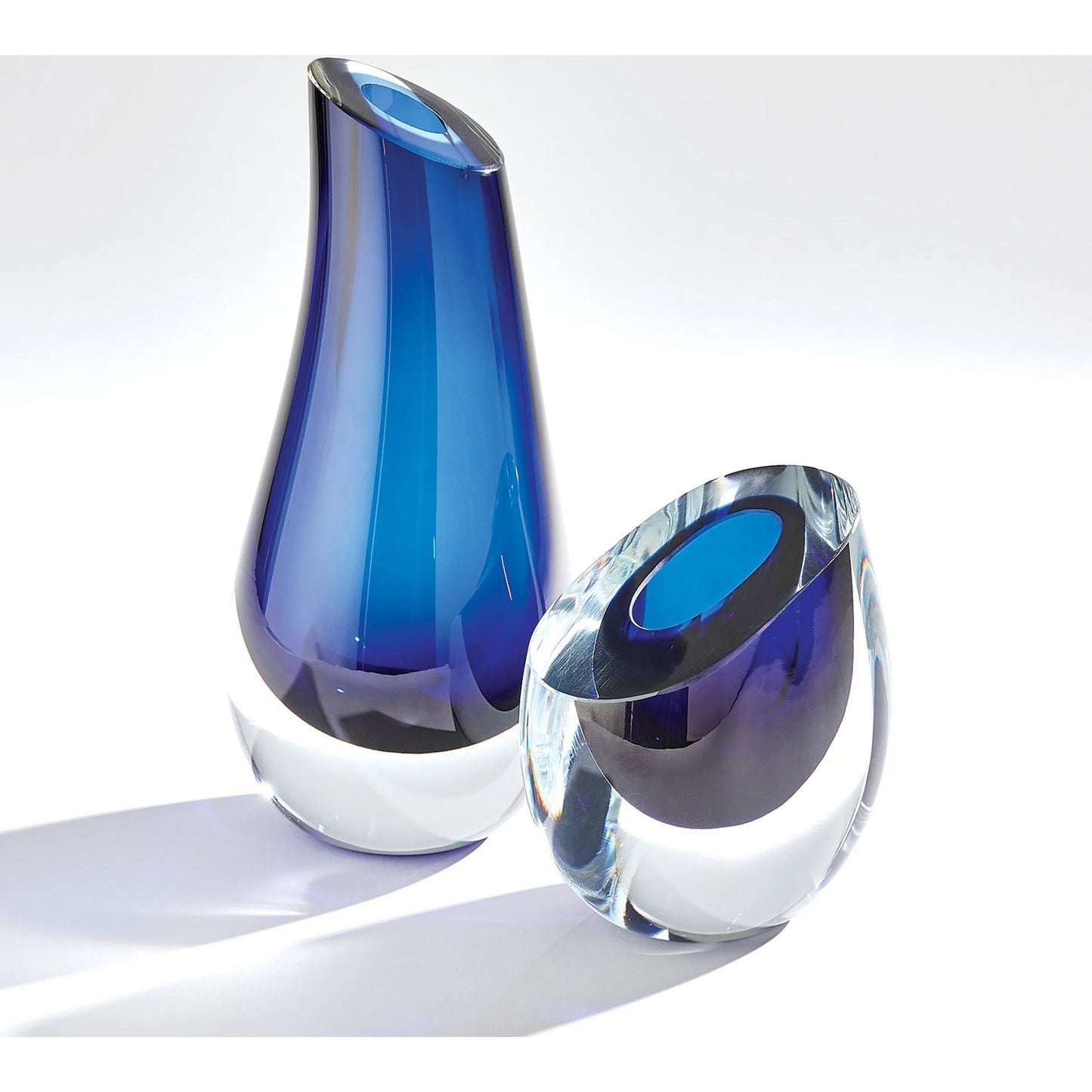 006 SI-2445756,SI-2445757 | Additional Silo | Slant Vase by Global Views. Made from art glass in a modern style.