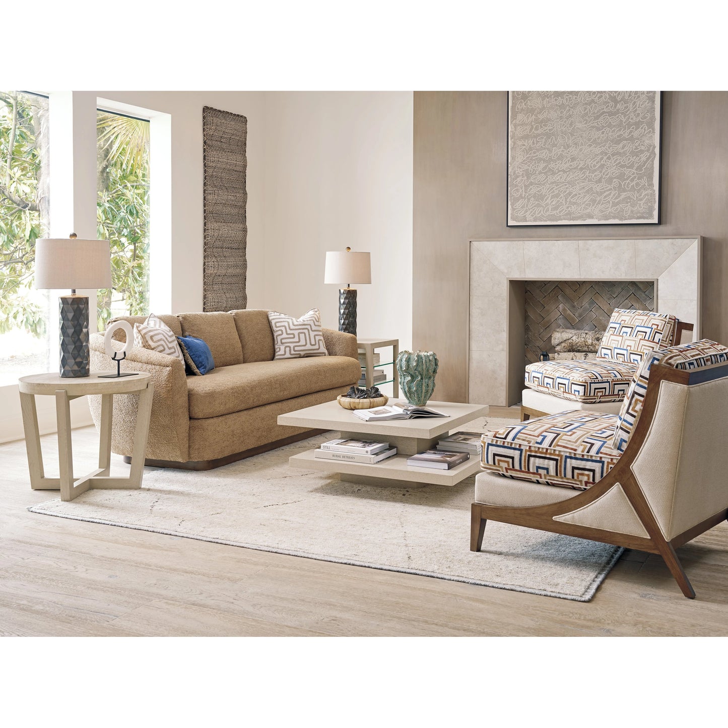 006 SI-2136904 | Lifestyle | Shasta Round Lamp Table by Tommy Bahama Home in sand drift. Made from unique in a modern style.