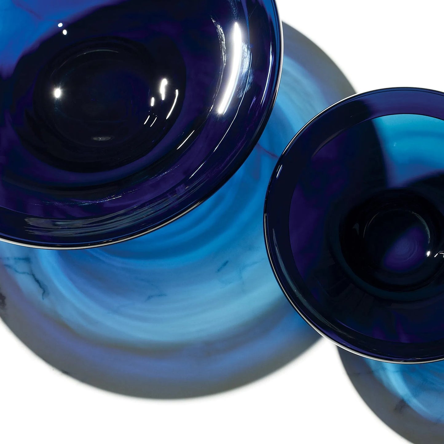015 SI-2324597,SI-2324598 | Closeup | Tourneau Bowl by Global Views. Made from art glass in a eclectic & global style.