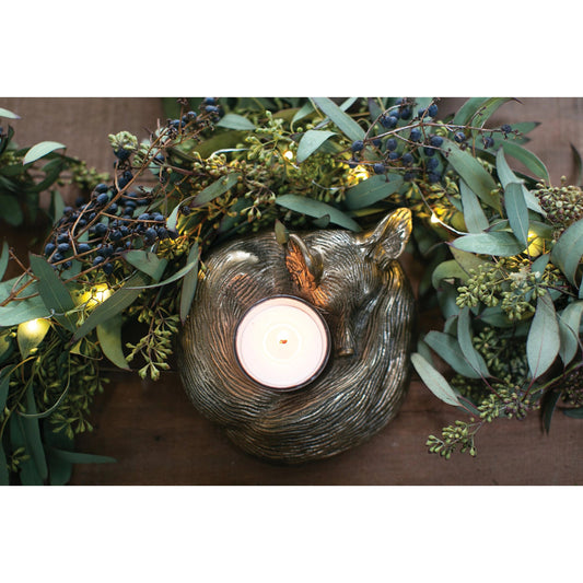 E+E Sleepy Eloise Candleholder by Accent Decor in gold. Made from metal in a traditional style.