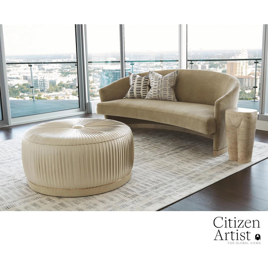 Colette Ottoman by Global Views. Made from brass, leather in a modern style.