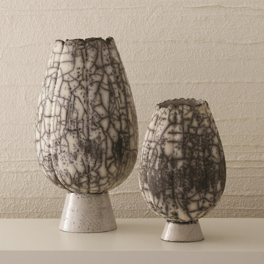 Crackled Footed Vase by Global Views in black raku. Made from ceramic in a modern style.