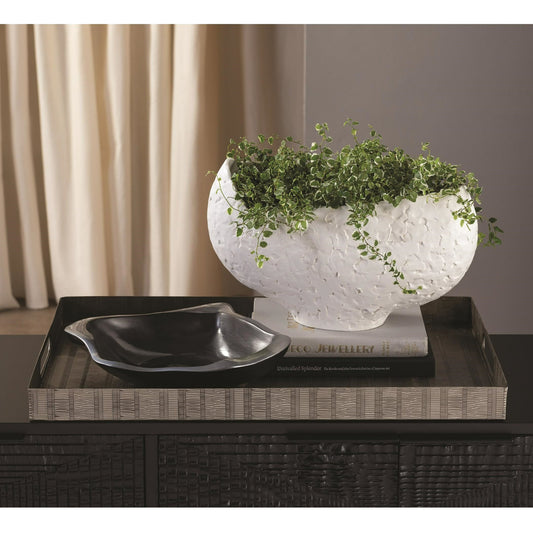 Asymmetrical Stipple Bowl by Global Views in matte white. Made from ceramic in a coastal style.